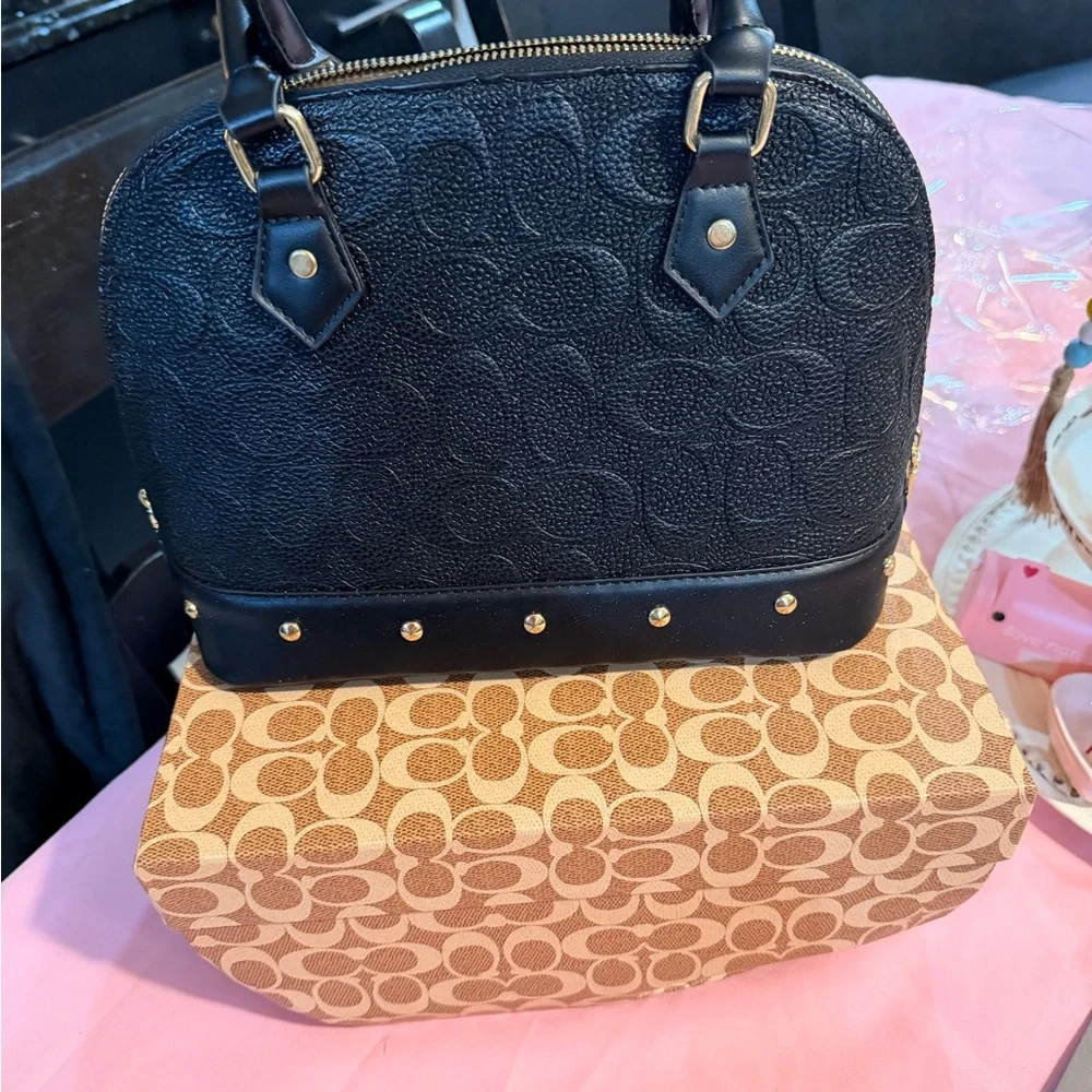 Elegant‎ Black Handbag with Gold Accents